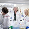 Three researchers from the Katz School of Medicine's CSAR lab collaborating on research together