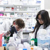 Two Katz students conducting research in a lab.