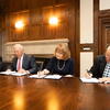 Jane Sullivan joins President John Fry and Trustees Mitchell Morgan and Phillip Richards to sign the historic gift agreement to create the Jane Creamer Sullivan and Thomas J. Sullivan Honors College.