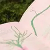 An animated photo of the pages of an illustrated book's pages in the wind