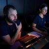 Eric Cordes and team members watching footage captured by their submarine, Alvin