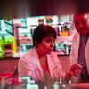 Biologists Alla Arzumanyan and Mark Feitelson working together in the lab